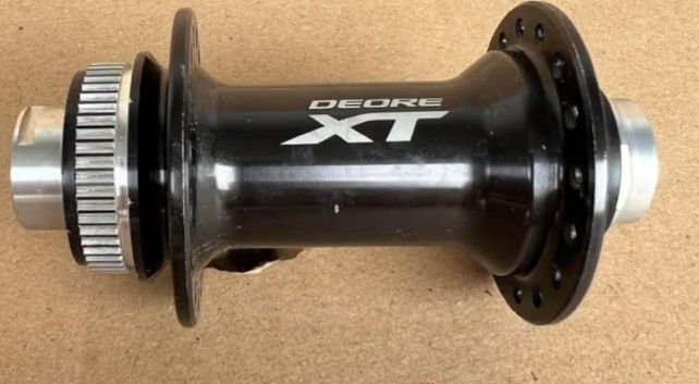 Передняя втулка Shimano Deore XT HB-M8010 15 мм/100 мм, 32H, чёрный